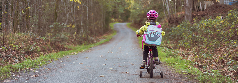 child on bike